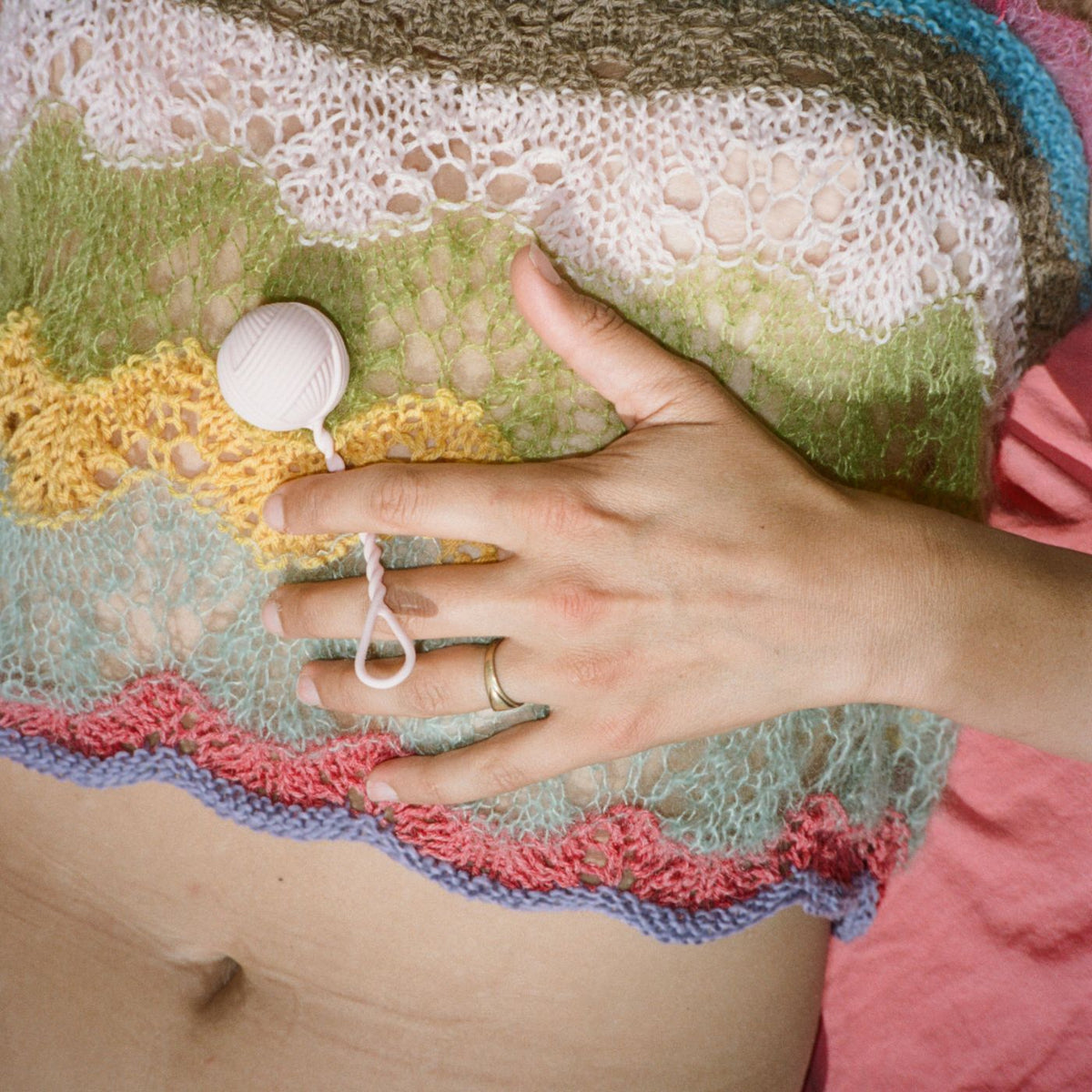 Lærke Bagger x PEECH vibrator with colourful knitwear